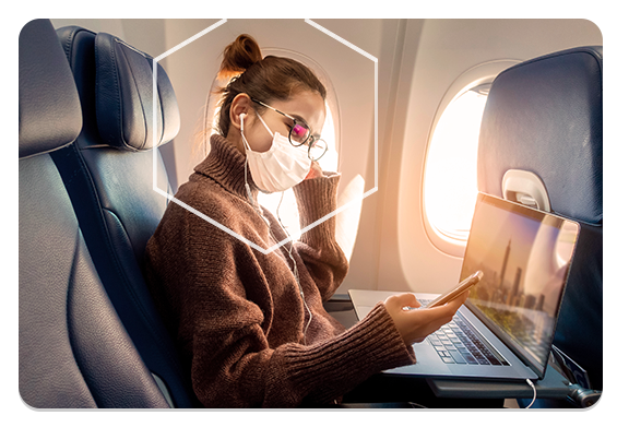 travel-tabbed-1-565x391 Woman wearing mask on plane
