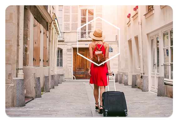 travel-tabbed-2-565x391 Woman traveling with backpack and suitcase